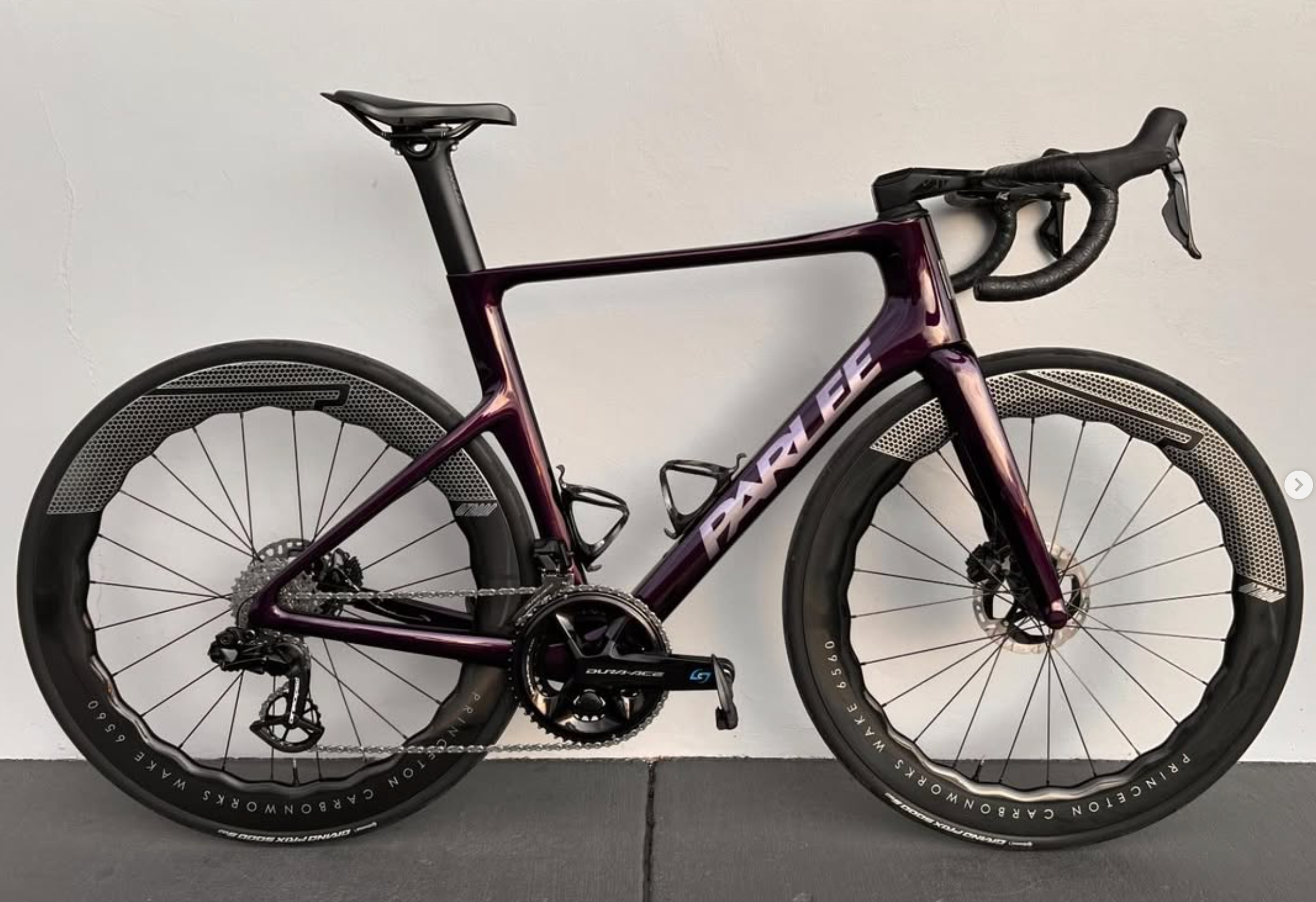 Purple bicycle with 'Polar' branding on a white background